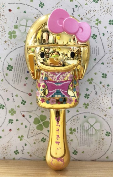 【震撼精品百貨】Hello Kitty 凱蒂貓-日本SANRIO三麗鷗 KITTY手握梳子-金粉*25870