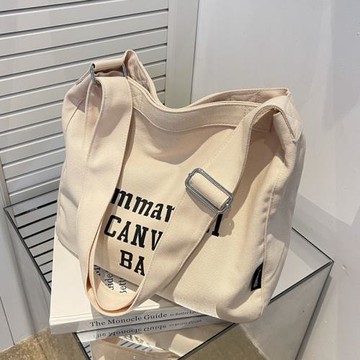 大學生上課包包女2025新款百搭斜挎帆布包休閑單肩包大容量托特包