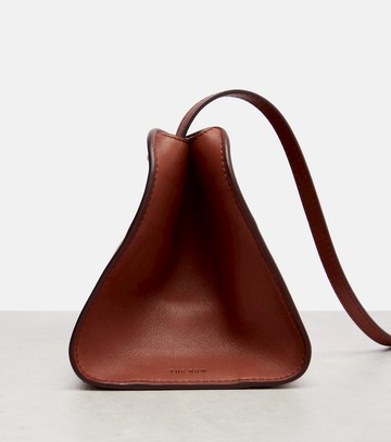 The Row Peggy leather clutch