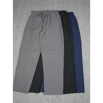 外貿男士大碼戶外防風防水滑板運動褲內網沖鋒褲速干寬松哈倫褲