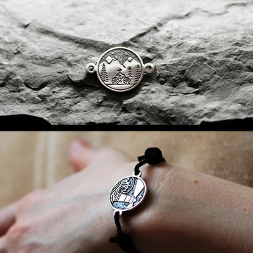 自行車與山景銀手鍊，旅人像徵。自然愛好者旅遊