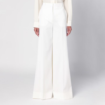Cream-coloured wool flared trousers