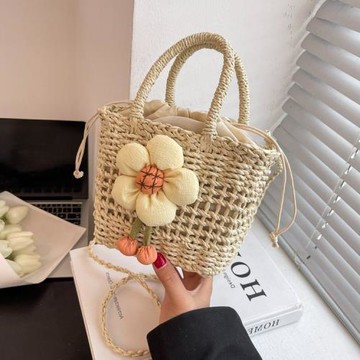 高級感草編包包女冬2025新款小眾設計菜籃子斜挎包編織手提水桶包
