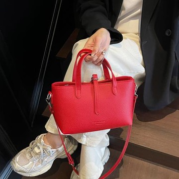 韓系時尚洋氣手提水桶包包女2025夏季新款簡約個性通勤單肩斜挎包