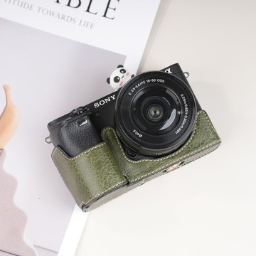 適用索尼A6400底座A6700保護套A7C2皮套A7m4相機包肩帶戶外配件 d7251