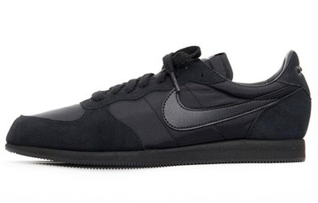 COMME DES GARÇONS X EAGLE TRIPLE BLACK
