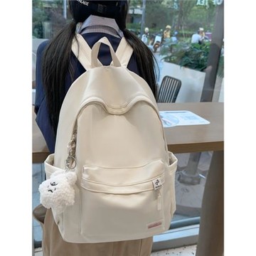 書包女初中生2025新款高顏值大學生簡約純色雙肩包輕便百搭背包潮