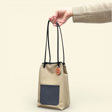 nico 米白x黑 潑水加工尼龍材質x義大利皮革束口袋