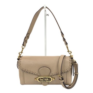 coach杏色皮革肩背腋下包