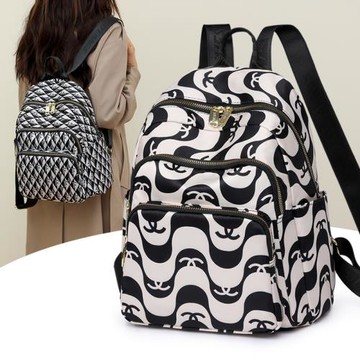 牛津布印花雙肩包女大容量帆布2025新款時尚百搭旅行中年媽媽背包