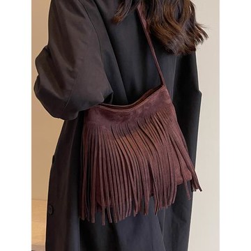 小眾設計包包女秋季2025新款時尚磨砂單肩斜挎包高級感流蘇水桶包