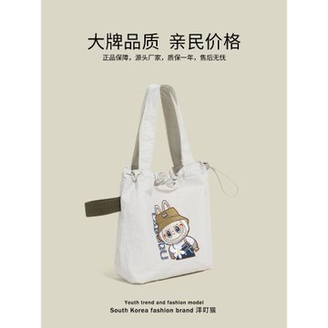 洋叮貓日系可愛尼龍刺繡水桶包包女2025新款百搭通勤手提單肩小包