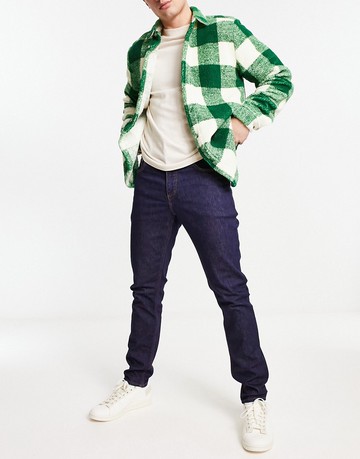 ASOS DESIGN stretch slim jeans in indigo-Blue
