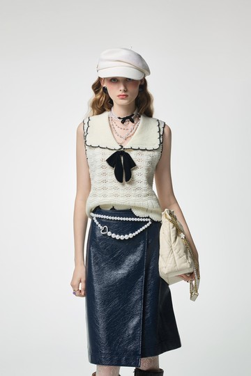 綴蝴蝶結別針針織上衣