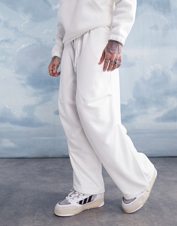 ASOS DESIGN oversized parachute joggers in off white-Green
