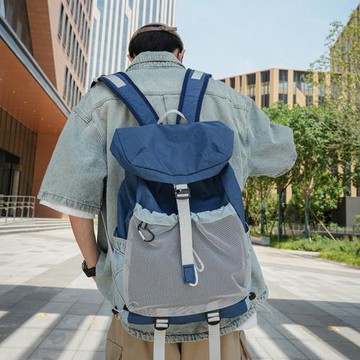 簡約拼色背包運動旅行大學生電腦書包2024新款輕便爬山旅游雙肩包