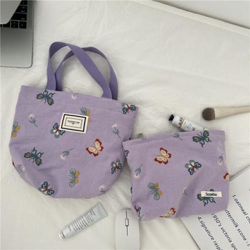 小白兔幾日系新款蝴蝶刺繡手提便當包化妝包女遛彎逛街零錢收納袋