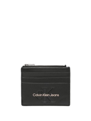 Calvin Klein Jeans - logo-embossed faux-leather wallet - women - Polyurethane - One Size - Black