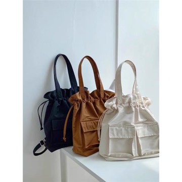 25新款時尚工裝風抽繩束口單肩大包尼龍布背包旅行學生雙肩包兩用