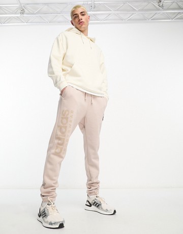adidas Sportwear Lounge fleece joggers in brown