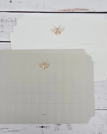 Elegant die cut rectangular card with rose gold foil embosse