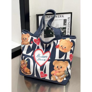 黃油小熊大容量單肩包2025新款小眾字母手提袋購物袋帆布包托特包