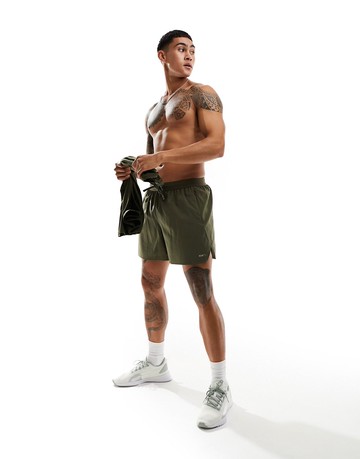 Puma Running Evolve 5 inch woven shorts in khaki-Green