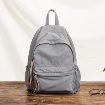 王與里卡輕便牛津布雙肩包女新款簡約書包休閑百搭旅行登山小背包