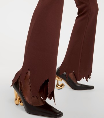 JW Anderson Ribbed-knit distressed slim pants