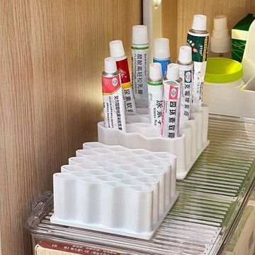免運💒臺灣熱銷🐬藥膏收納硅膠化妝品收納架盒硅膠多功能口紅眉收納桌面波浪形支架