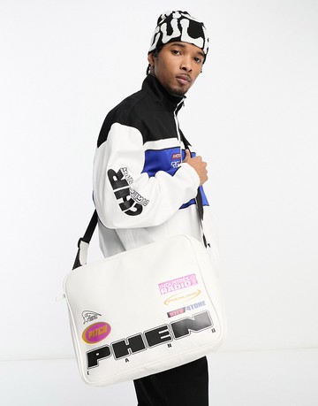 ASOS DESIGN faux leather messenger bag with text print in ecru-White