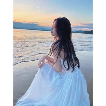 三亞旅游拍照衣服女海邊度假沙灘裙超仙白色露背吊帶連衣裙仙女裙