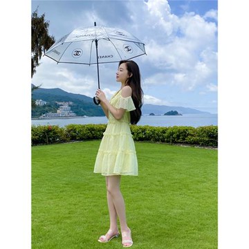 溫柔黃色心機露肩蛋糕連衣裙女夏日多巴胺法式高腰高級感提花裙子