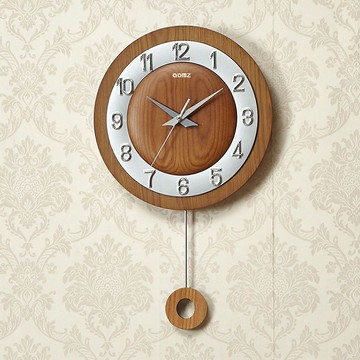 奧名思現代簡約創意時尚客廳家用靜音實木掛鐘