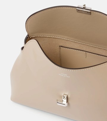 Toteme T-Lock leather clutch