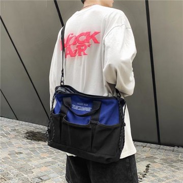 帆布斜挎包潮牌大容量休閑日系郵差包新款工裝學生背包機能單肩包