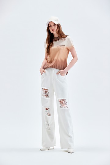 個性大刷破白色牛仔褲