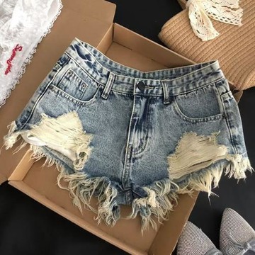 美式辣妹顯腿長牛仔短褲女夏季不規則破洞露口袋設計感百搭熱褲子