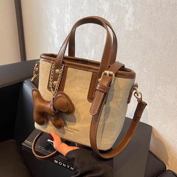 MK DA小包包女2025新款小眾設計手提帆布水桶包高級感單肩斜挎包