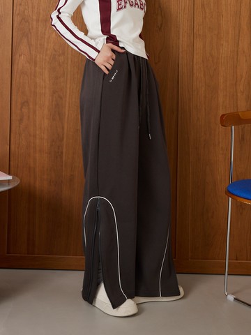 小翅膀褲口拉鍊彎刀長褲