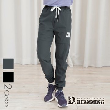 Dreamming 潮流網孔字母彈力休閒束口褲 鬆緊 慢跑褲 透氣-共二色