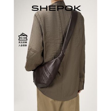 西泊克小號羊皮牛角包小眾真皮可頌包餃子包大容量中號斜挎包胸包