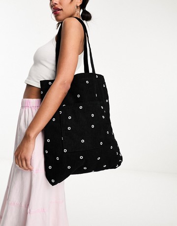 Skinnydip daisy corduroy embroidered tote bag in black