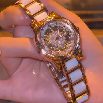 一件代發抖音視頻號爆款太陽花鏤空女士手表陶瓷白飛輪鑲鉆手表女