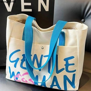 新款 字母帆布包包女大容量通勤包新款大學生上課單肩百搭托特包