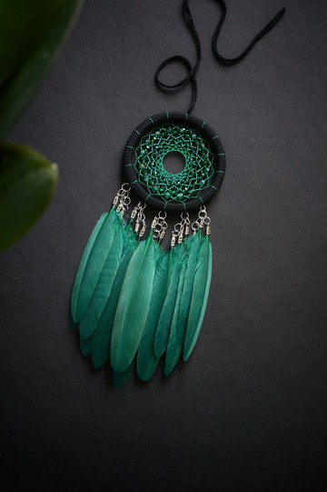 瓶綠色的捕夢網。小追夢車後視鏡尺寸