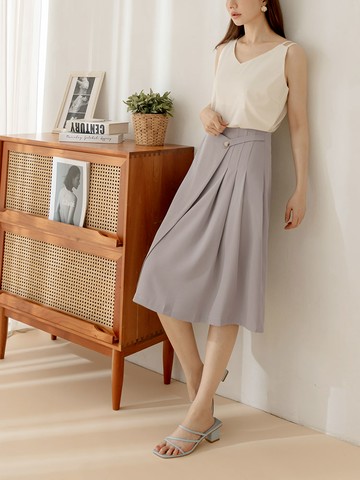 素色不對稱剪接壓摺中長裙