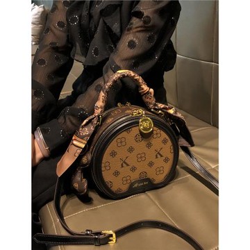 香港品牌包包女式2025新款春夏高級感單肩小包真皮手提斜挎小圓包