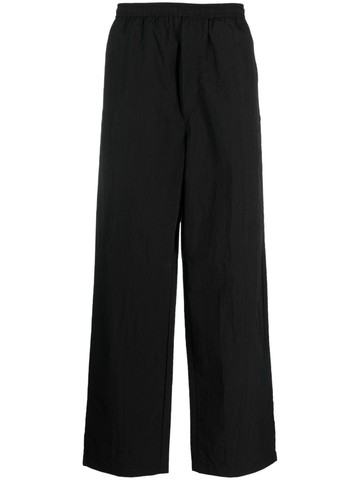 Acne Studios - elasticated-waistband recycled nylon trousers - unisex - Recycled Nylon/Cotton - XS - Black