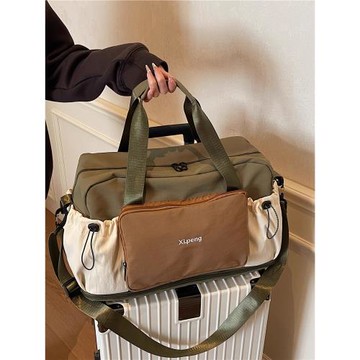 旅行包女大容量手提輕便防水行李袋短途外出旅游登機待產包收納包